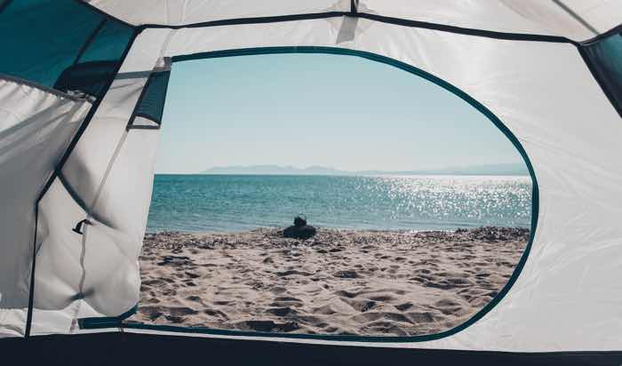 white tent overlooking to the beach